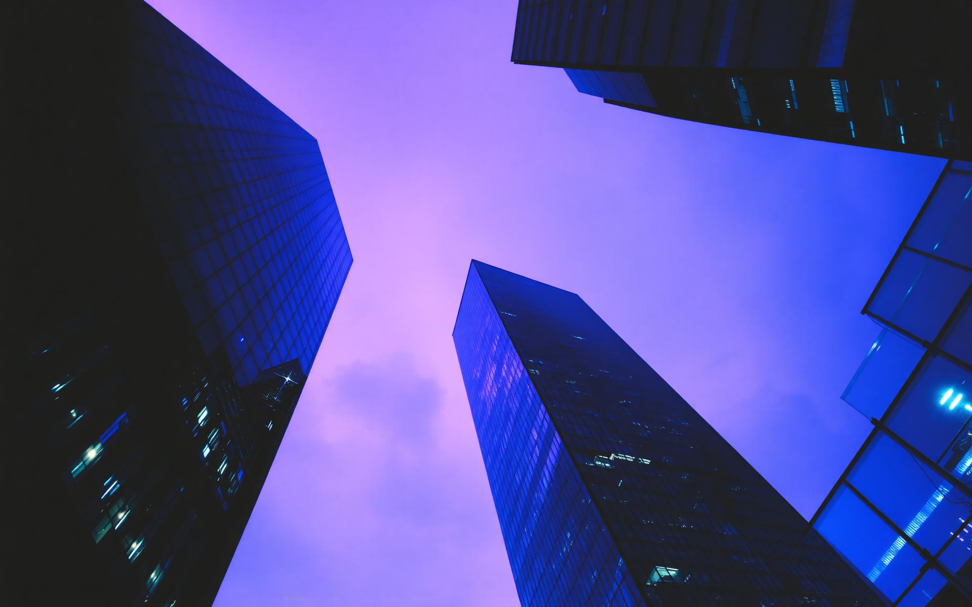 Glass office towers at dusk